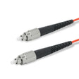 FC-FC multimode OM1 simplex fiber patch cable with Corning InfiniCor OM1 62.5/125um fiber, orange jacket, available in custom lengths. Ideal for data centers, enterprise networks, and server rooms.