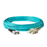 0.2dB SC/UPC to FC/UPC Multimode OM3 Duplex Fiber Patch Cable | Corning ClearCurve OM3 50 µm Laser-Optimized Fiber |  Aqua OFNR Jacket, Beige  Connectors