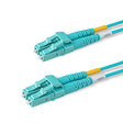 Aqua LC-LC multimode OM4 fiber patch cable with Corning OM4 50/125um optical fiber, aqua jacket, available in custom lengths and specifications. Ideal for data centers, enterprise networks, and telecom rooms.
