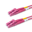 Magenta LC-LC multimode OM4 fiber patch cable with Corning OM4 50/125um optical fiber, magenta jacket, available in custom lengths and specifications. Ideal for data centers, enterprise networks, and telecom rooms.